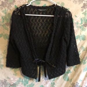 Cropped  black cardigan by Romy. Size medium.